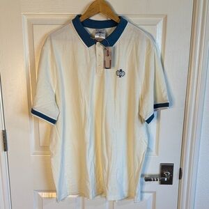 Classic Cream Polo Shirt with Blue Trim. Pickleball theme!